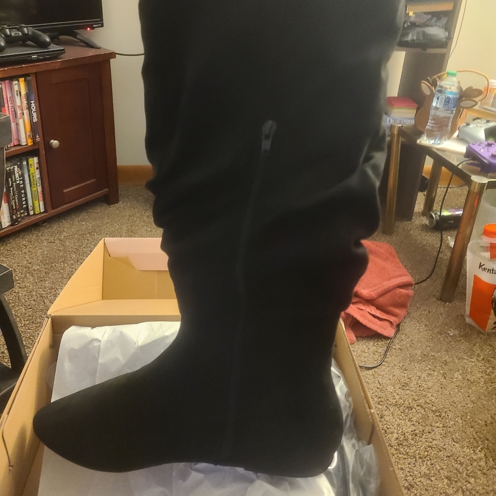 Knee high black boots